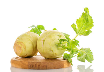 Wall Mural - Two ripe kohlrabi on a wooden tray, macro, isolated on white background.