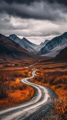 Poster - A winding road in the middle of a desert with mountains in the background