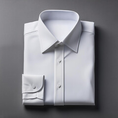 A neatly folded white shirt over a gray background