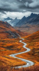 Poster - A winding road in the mountains with a beautiful orange and brown landscape