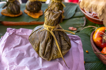 Chicken juane wrapped in bijao leaves. Peruvian jungle food, in all its varieties. Feast of San Juan, Iquitos Peru