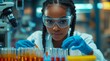 © ZMPixels - Candid black pharmaceutical lab specialist analysing medicine vials & hospital patient samples African american female medical student working in science laboratory on research PPE protective clothing
