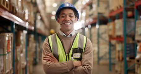 Canvas Print - Happy, logistics and man with crossed arms in warehouse with pride for career in cargo shipping. Smile, confident and portrait of male industry worker in ppe in supply chain storage for delivery.