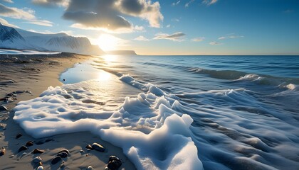 Midnight sun illuminating a serene Arctic beach landscape