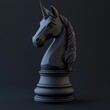 © DZMITRY - The black unicorn as a chess piece is isolated on a dark background