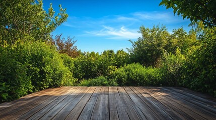 Sticker - Wooden deck in a lush green garden with a blue sky and white clouds.