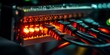 © kwanchaift - a network switch, blinking LEDs indicating active data transmission, with neatly connected Ethernet cables.