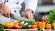 © BOJOShop - Chef Chopping Fresh Vegetables in a Kitchen   Healthy Food Preparation