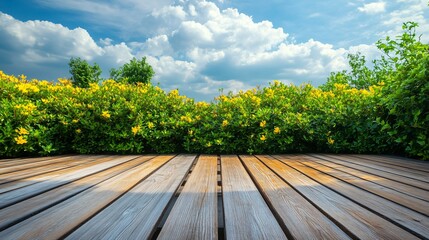 Sticker - Wooden floor with green bushes and yellow flowers under a blue sky with white clouds.