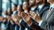 © Arifin Studio - Business people applauding. Group of business people clapping in row. Banner background.