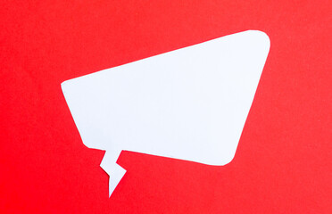 white paper speech bubble on red background