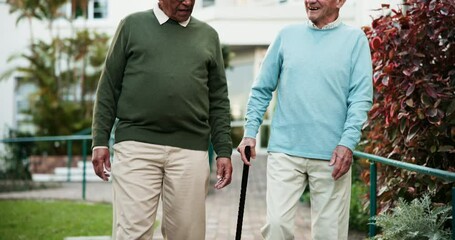 Canvas Print - Nursing home, senior men and walk in garden for leisure, bonding and sharing past story in morning. Elderly friends, stroll and chat on pathway for memories, conversation and comfort in retirement