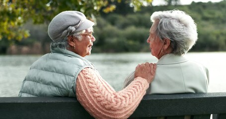 Wall Mural - Discussion, senior women and park with support from grief, sad story and cancer news outdoor. Reunion, retirement and empathy of elderly friends by lake with communication and kindness of friendship