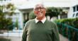 © KayExam/peopleimages.com - Portrait, smile and senior man outdoor by nursing home for wellness, health or life insurance. Glasses, retirement or face of happy elderly person at garden to relax, fresh air or confident in Brazil