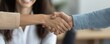 © Jayda_ArtistryHub - Person celebrating a job promotion at work, smiling while shaking hands with their manager   promotion, career success