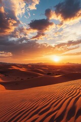 Wall Mural - Stunning Sunset Over Desert Dunes with Dramatic Clouds and Golden Light