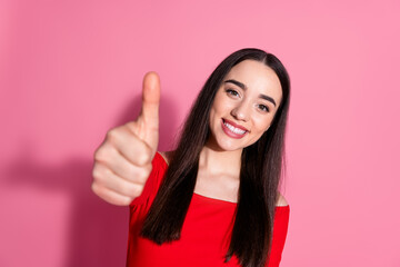 Canvas Print - Photo of nice young girl show thumb up red top isolated on pink color background