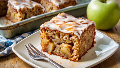 Poster - A square piece of apple pie with a moist texture and large pieces of apples on a plate