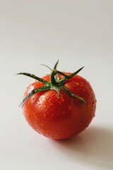 Canvas Print - Fresh tomato with water droplets on its skin, great for food and kitchen related concepts