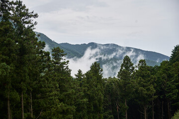 time clouds over the mountains