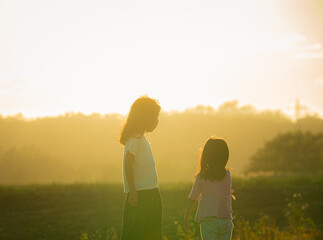 Peaceful Sunset with Children Outdoors