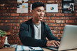 © Frank Coop/peopleimages.com - Man, fitness instructor and laptop in office at gym for schedule, reading or happy for subscription growth. Personal trainer, computer and smile for typing, review or contact client for exercise plan