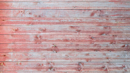 Poster - A wooden wall with a grainy texture. The wood is red and has a natural look. The wall is empty and has no furniture or decorations
