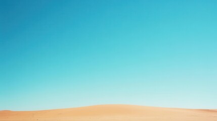 A distant desert dune landscape under a clear blue sky, serving as a minimalist background