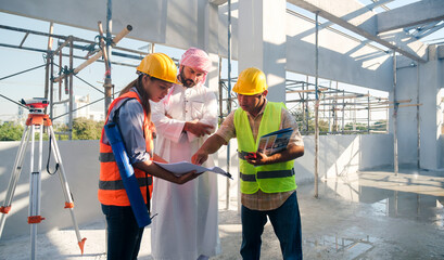 Construction industry workers, team of builders, architect engineer and contractors planning with blueprint design, communication teamwork unity, male and female working together building site.