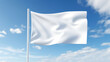 © LiliGraphie - Blank white flag waving in the wind against a clear bkue cloudy sky. Mockup template
