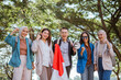 © Odua Images - male student and friends holding indonesian flag and megaphone celebrating indonesian independence day