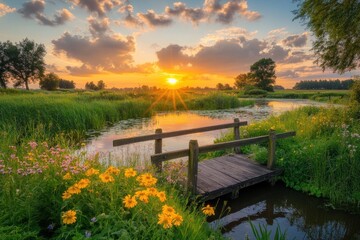 Sticker - A serene sunset over a tranquil river with flowers and a wooden bridge.