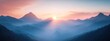 © Supriyanto - A serene sunrise over misty mountains, showcasing natural beauty and tranquility.