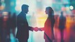© Johannes - diverse business people shaking hands blurred soft light background