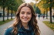 © ThomasLENNE - Close portrait of a smiling young Slovak woman looking at the camera, Slovak outdoors blurred background