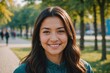 © ThomasLENNE - Close portrait of a smiling young Uzbek woman looking at the camera, Uzbek outdoors blurred background