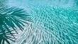 © namdarcreative - Top view of a blue calm and clear calm water surface, water texture with ripples and palm trees shadow