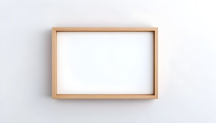 Minimalist blank wooden frame displayed on a clean white wall