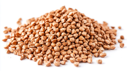 A close-up pile of buckwheat groats isolated on a white background.