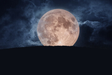 Poster - big amazing full moon with grass and starry sky with clouds. halloween creative