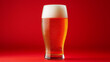 © Ramses - glass of beer on red background