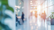 © Michael - Hustling office corridor with people in motion, blurred backdrop brings energy to contemporary interior, mirroring corporate professionalism