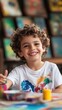 © Simone - Smiling Child Painting with Bright and Vivid Colors