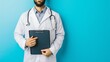 © Zhanna - A midsection view of a male doctor wearing a white coat and holding a clipboard, standing against a vibrant blue background. The doctor has a stethoscope draped around his neck, adding a professional