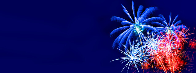Wall Mural - fireworks banner, colorful sylvester-fireworks on blue background with space for text. independence 