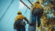 © bomie - Two Utility Workers Climbing a Power Pole