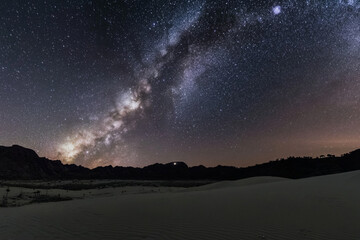 milky way in the sky at the sand fields