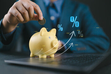 Poster - Businessman hand on piggy bank with growth up arrow, saving money wealth and financial concept, Business, finance, investment, Financial planning. Interest rate financial. Investment returns.