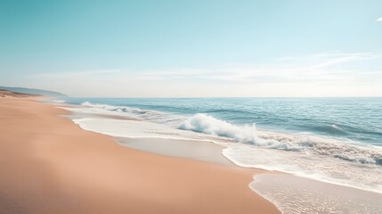 1. A picturesque summer beach scene featuring soft golden sand and gentle waves, with a clear blue sky overhead, creating an ideal backdrop with ample copy space for text or product mockup