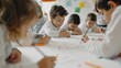 © Pemika - Children drawing together in a colorful classroom setting.